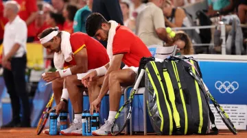 Carlos Alcaraz and Rafael Nadal.