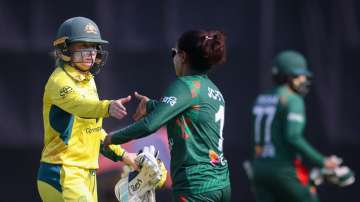 Alyssa Healy shakes hands with Nigar Sultana Jyoti.