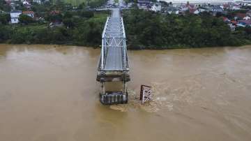 A bridge collapse due to floods triggered by typhoon Yagi in Phu Tho province