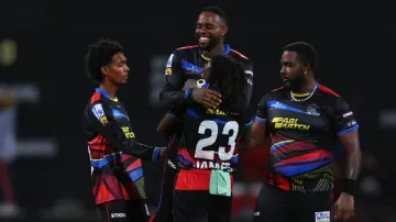 Antigua and Barbuda Falcons' Roshon Primus (extreme right) bowled a wayward 13-ball over against the Barbados Royals in CPL 2024