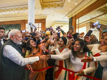 Prime Minister Narendra Modi interacts with members of the Indian diaspora, in Brunei.