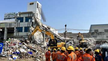 NDRF and SDRF personnel during relief work at the collapsed building