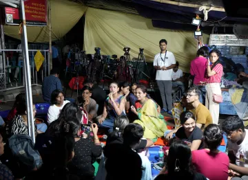 Junior doctors continue their dharna against the RG Kar Hospital rape and murder incident, near Swasthya bhawan in Kolkata