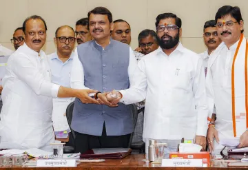 Devendra Fadnavis with Ajit Pawar and Eknath Shinde