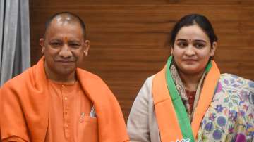 UP CM Yogi Adityanath and BJP leader Aparna Yadav