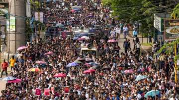 Junior doctors march towards Swasthya Bhawan during a protest over RG Kar Hospital rape and murder incident, in Kolkata.