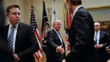 Elon Musk, left, and President Donald J. Trump in 2017 at the White House during a breakfast for bus