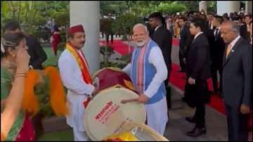 Prime Minister Modi playing the 'dhol' in Singapore