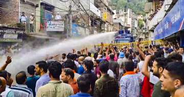 Mandi: Police use water cannons to disperse protestors demanding the demolition of a mosque allegedly built on encroached land, in Mandi, Himachal Pradesh.