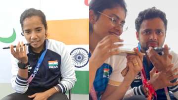 Preethi Pal, Rubina Francis and Manish Narwal on a phone call with PM Narendra Modi.