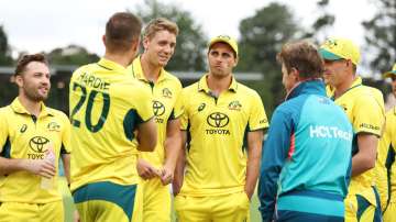 Lance Morris (centre) listens to a team chat.