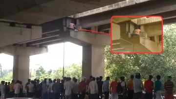 Noida: Girl cheats death as she lands on pillar of elevated road after being hit by vehicle | VIDEO