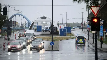 Vehicles pass by a checkpoint on the German-Polish border crossing "Stadtbruecke", in Frankfurt