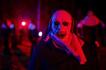 Visitors dressed in a ghost costumes at Goosebump market as a part of Halloween festival