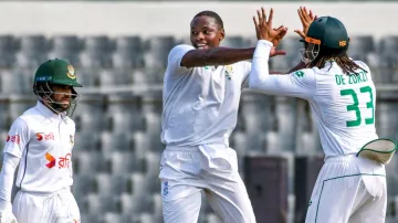 Kagiso Rabada celebrating with his teammates after picking a couple of wickets late in the day on October 30