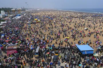 People leave after witnessing the Indian Air Forces (IAF) air show as part of the 92nd anniversary celebrations of IAF, at Marina Beach, in Chennai,