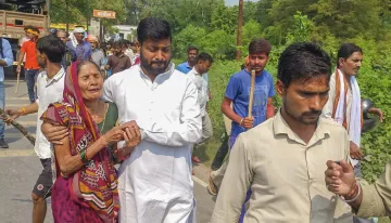 Relatives of the 22-year-old man who was killed in communal violence on Sunday attend his funeral procession, in Bahraich