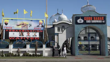 A sign outside the Guru Nanak Sikh Gurdwara temple is seen after the killing on its grounds in June 