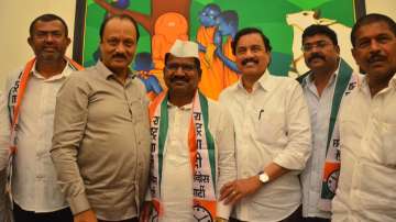 Maharashtra Deputy CM Ajit Pawar welcomes Congress MLA Hiraman to his party 