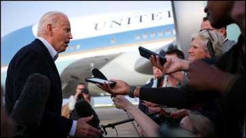 US President Joe Biden speaks to journalists in Maryland.