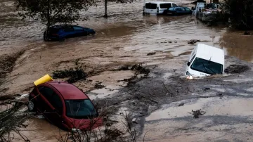 Cars are being swept away by the water, after floods preceded by heavy rains caused the river to overflow its banks in the town of Alora, Malaga, Spain