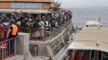 People gather at the port of Goma, Democratic Republic of Congo.