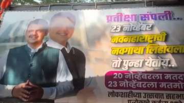 Posters of Devendra Fadnavis appear at state BJP headquarters. 