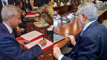 EAM S Jaishankar (L) at SCO Summit in Islamabad and Pakistani FM Ishaq Dar (R) 