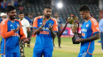 Suryakumar Yadav with the trophy after beating Bangladesh.