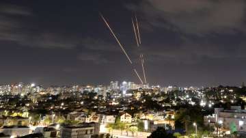 Israel's Iron Dome anti-missile system intercepts rockets after Iran fired a salvo of ballistic missiles.