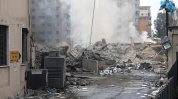 The aftermath of Israeli strikes in Chiyah, southern Lebanon.