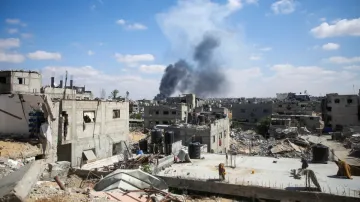 Smoke rises following an Israeli strike in Gaza.