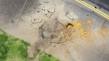 Part of a damaged taxiway at Miyazaki Airport in southwestern Japan.