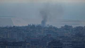 Smoke billows from an Israeli strike near Beirut's Rafic Hariri International Airport.