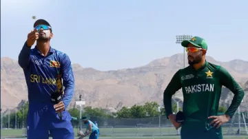 Nuwanidu Fernando and Mohammad Haris at the toss during the second semifinal.