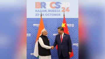 PM Modi and Xi Jinping shake hands in Kazan