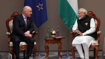 PM Modi with his New Zealand counterpart Christopher Luxon in Laos.