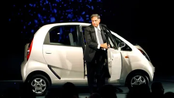 ata Group Chairman, Ratan Tata, steps out from the company's new "Nano" car during its launch at the