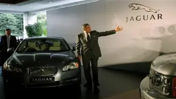 Ratan Tata posed with a Jaguar car