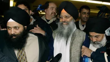 Ripudaman Singh Malik [centre] and a co-defendant were acquitted in 2005 of the bombing that killed 