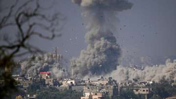 Smoke rises following an Israeli airstrike in the Gaza Strip, as seen from southern Israel