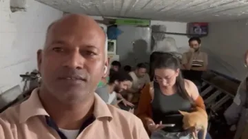 Indian nationals take shelter in safety rooms in Tel Aviv, Israel. 