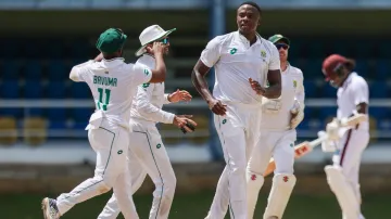 Temba Bavuma celebrates with Kagiso Rabada.