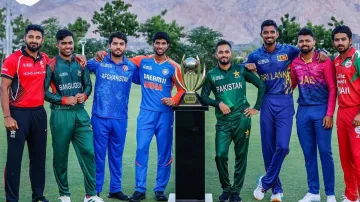 Captains of all eight teams pose with the trophy in Muscat.