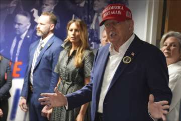 Donald Trump speaks to reporters after casting vote in Florida