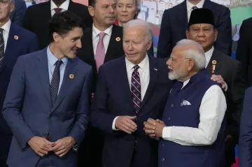 Canada PM Justin Trudeau (L), US President Joe Biden (C) and PM Modi at the G20 Summit in Brazil.