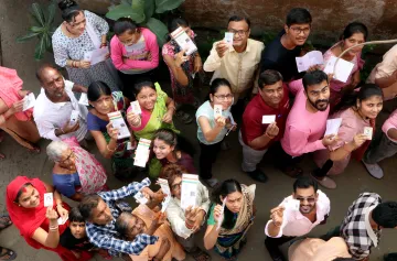 Voters posed for a photo click at a polling booth