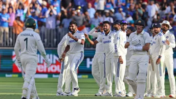 Jasprit Bumrah celebrates Usman Khawaja's wicket.