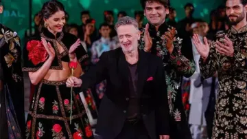 Rohit Bal made a poignant appearance at the Lakme Fashion Week in Delhi on October 14, unveiling his final collection, Kaaynaat: A Bloom in the Universe, before his passing on November 1.