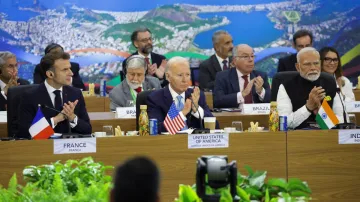 French President Emmanuel Macron, US President Joe Biden and India's Prime Minister Narendra Modi at